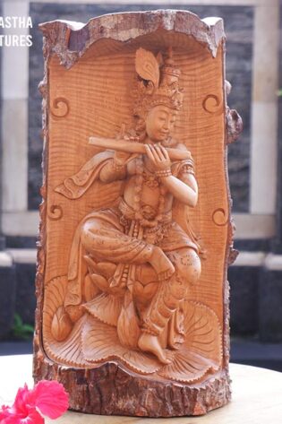 Lord krishna playing flute statue